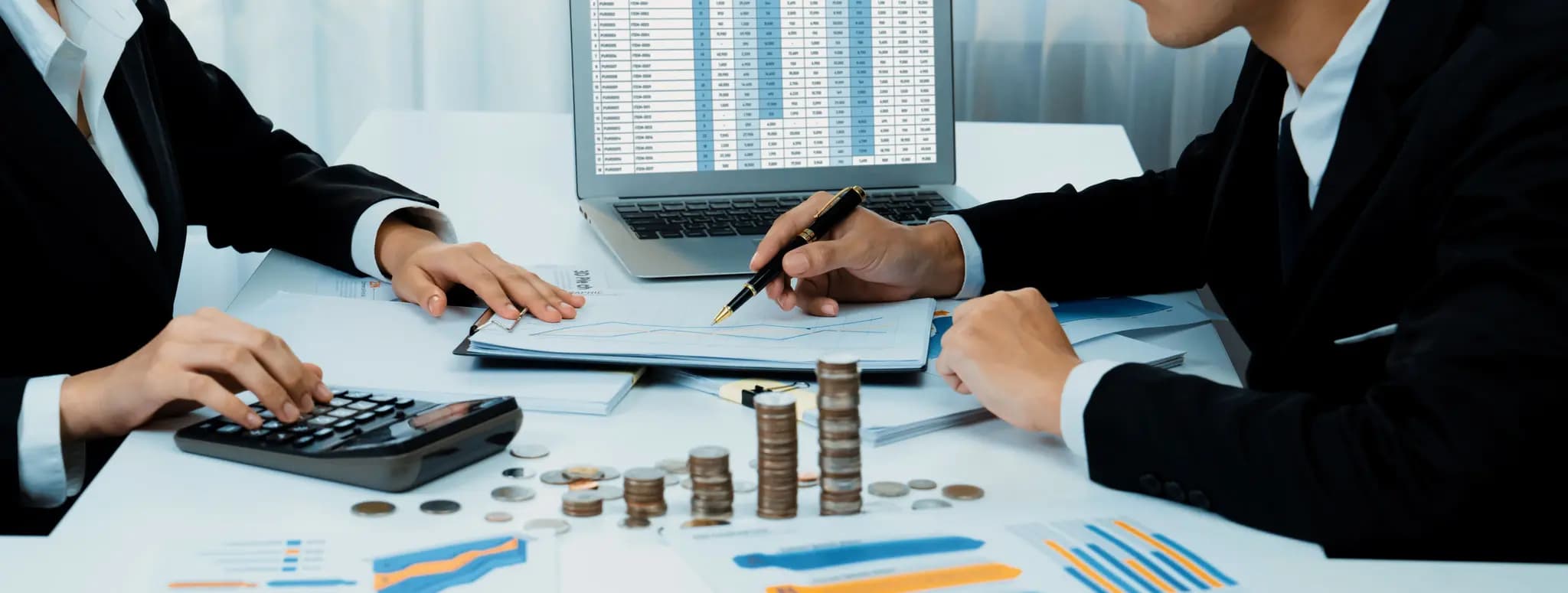 Financial services professionals reviewing structured data and analytics dashboards.